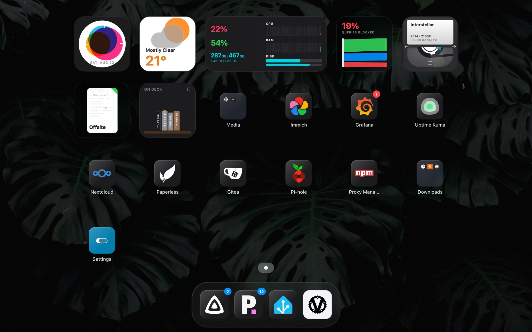 The Stackyard dashboard, showing widgets, app tiles, a folder and the dock.